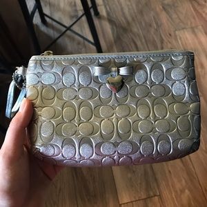 Silver/metallic Coach clutch/wristlet